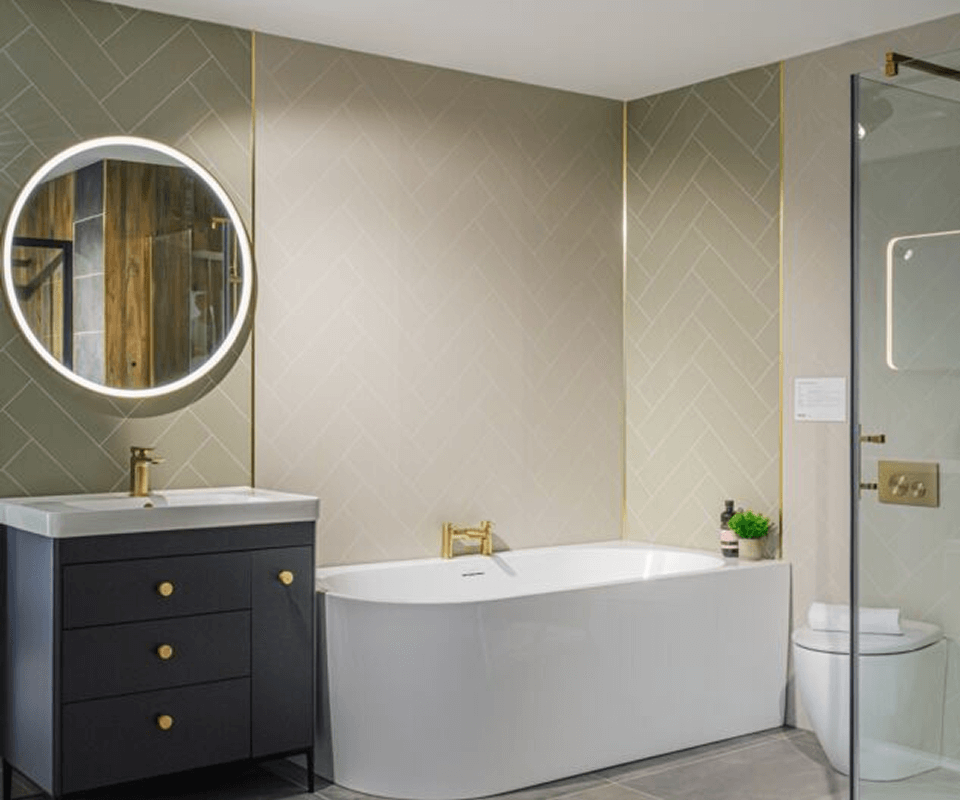 a bathroom featuring a bathtub and a shower area