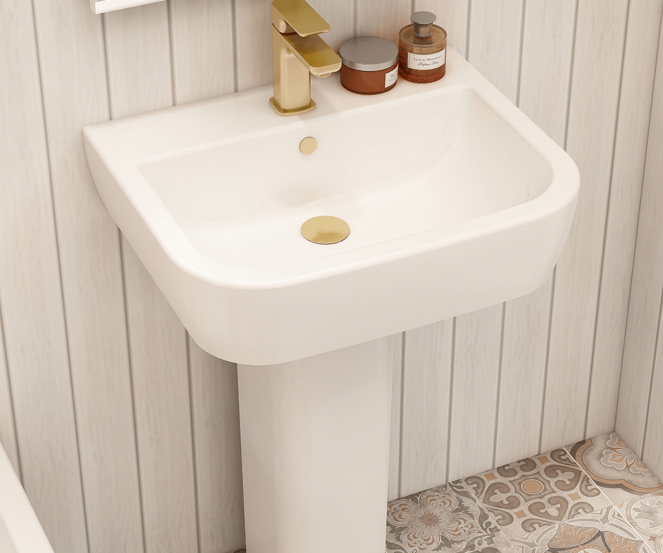 a white pedestal sink