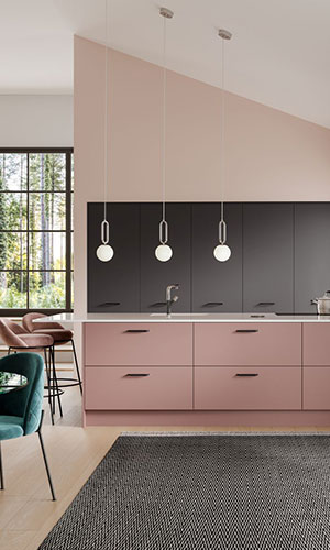 pale pink draws with white counter top with black cupboards