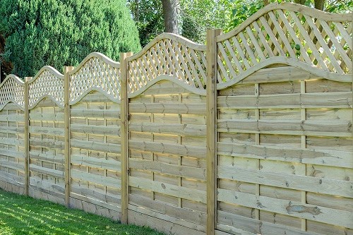 wooden fencing with gaps between slats of wood for air circulation