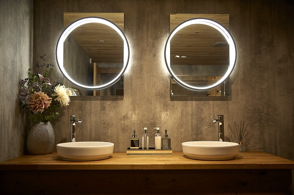 Dual sink bar top made of oakwood with dual mirrors with ring lights