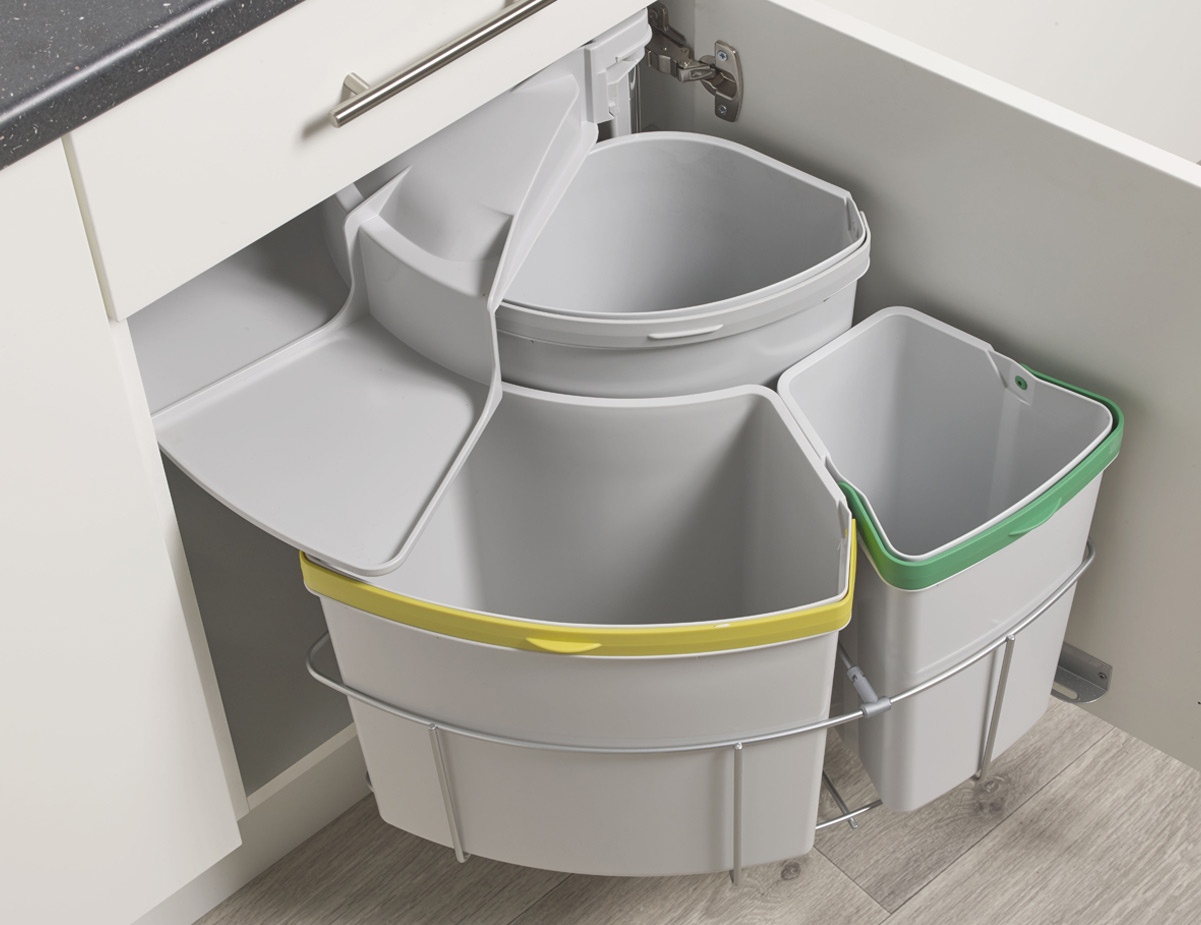 cupboard with three built in bins for different types of waste