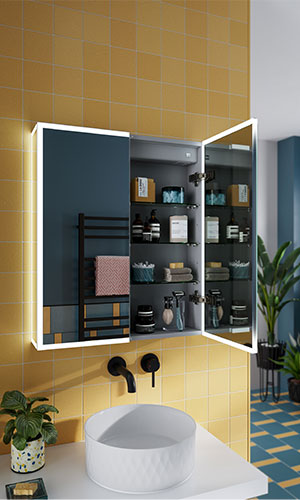 Mirrored bathroom cabinet with open door showing bathroom untencils and built in lights